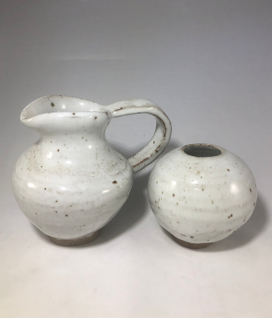 White pitcher and vase
