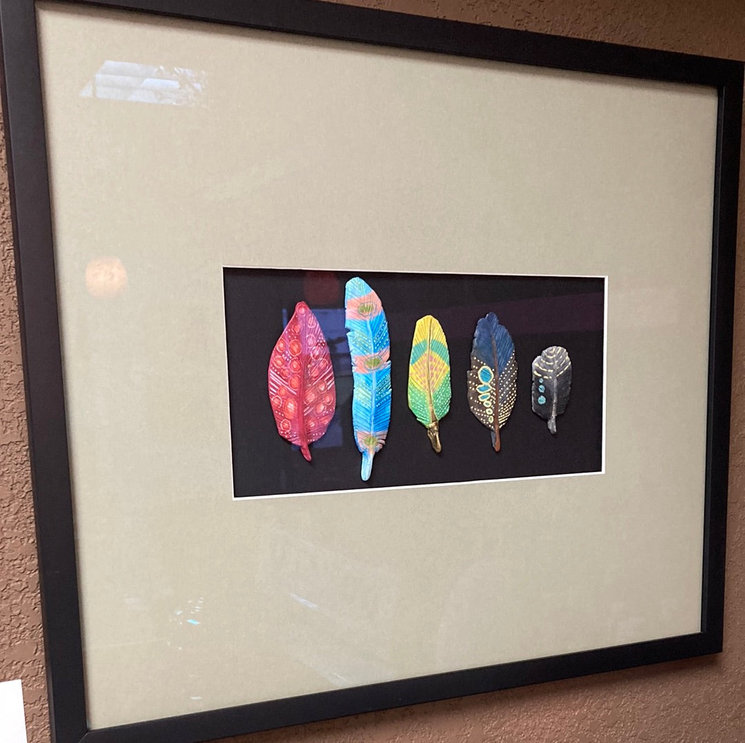 framed clay feathers