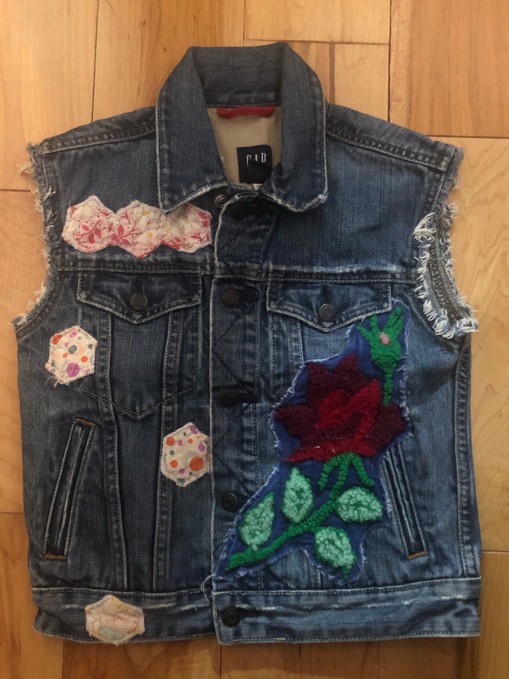 kids denim vest with flower stitched in